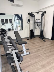 Weight training area inside the Aurora Swim Center fitness room at the Aurora Inn in Aurora, Ohio